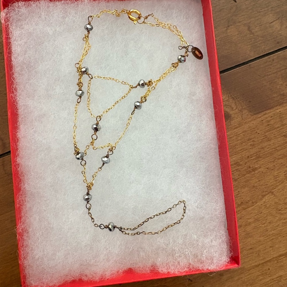 Elegant Gold and Black Pearl Necklace